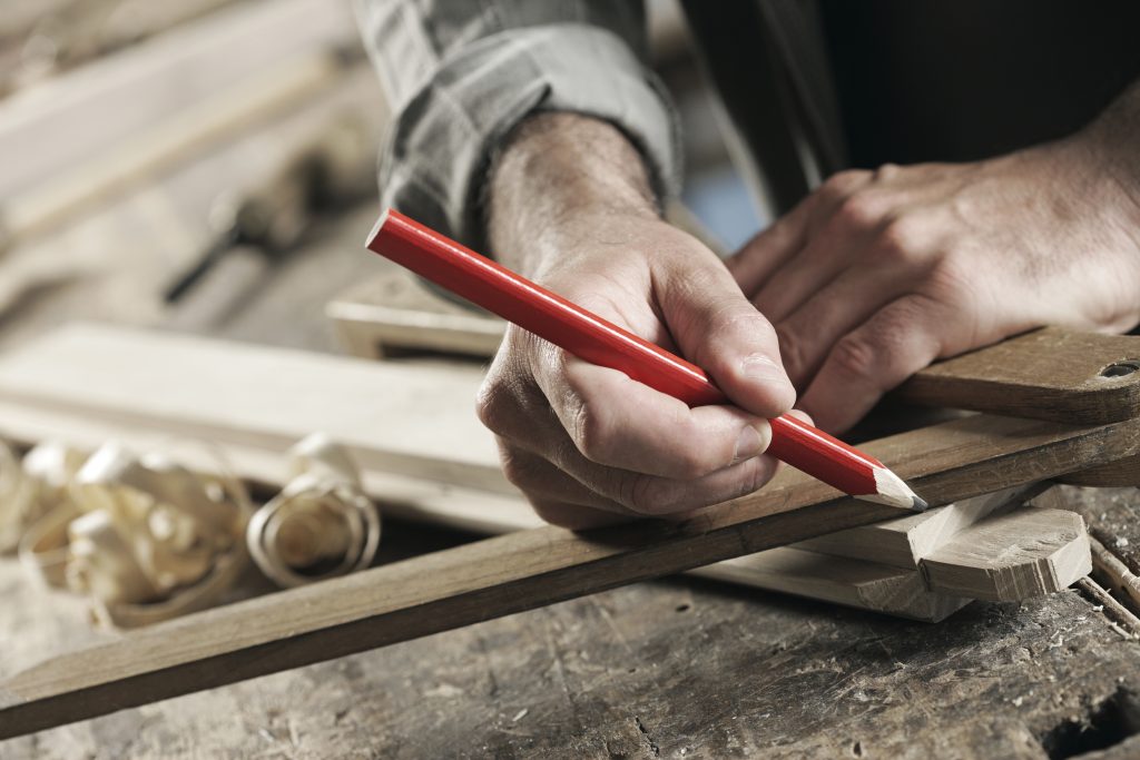 Carpenter Marking a Wooden Plank 2Can Carpentry